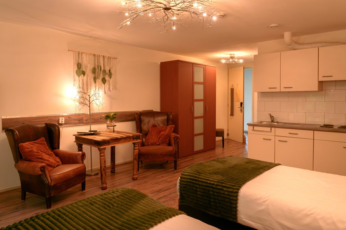Luxury studio at Hotel Bosch Duin Strand with living and sleeping area